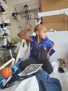 All-Star Rider posing in the hospital with his tongue out.